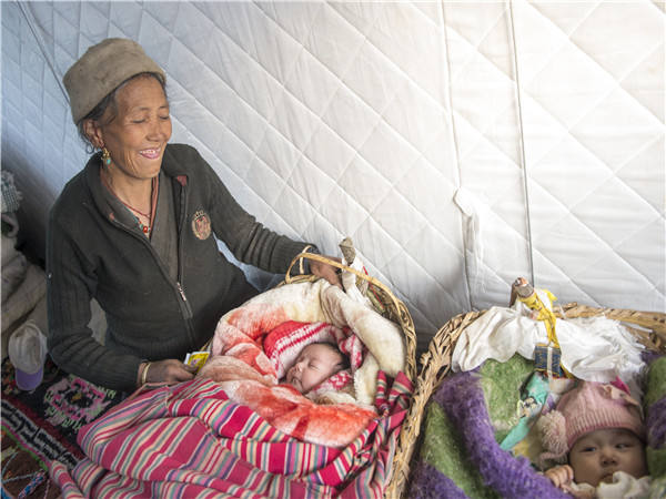 】新华社记者西藏灾区影像开元ky棋牌【凤凰涅槃(图3)